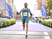 30 October 2022; Taoufik Allam from Dublin, crosses the line to become the 2022 Irish Life Dublin Marathon champion of the men’s field with a time of 2:11:30, during the 2022 Irish Life Dublin Marathon. 25,000 runners took to the Fitzwilliam Square start line to participate in the 41st running of the Dublin Marathon after a two-year absence. Photo by Sam Barnes/Sportsfile