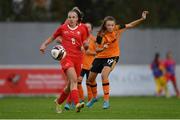 3 November 2022; Lauryn McCabe of Republic of Ireland in action against Emma Egli of Switzerland during the Women's U16 International Friendly match between Republic of Ireland and Switzerland at Whitehall Stadium in Dublin. Photo by Seb Daly/Sportsfile