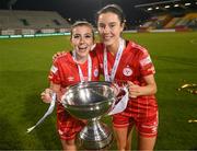 6 November 2022; Abbie Larkin, left, and Aoife Kelly of Shelbourne celebrate with the EVOKE.ie FAI Women's Cup after the EVOKE.ie FAI Women's Cup Final match between Shelbourne and Athlone Town at Tallaght Stadium in Dublin. Photo by Stephen McCarthy/Sportsfile