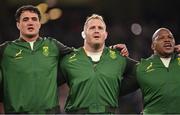 5 November 2022; South Africa players, from left, Franco Mostert, Vincent Koch and Bongi Mbonambi during the national anthems before the Bank of Ireland Nations Series match between Ireland and South Africa at the Aviva Stadium in Dublin. Photo by Brendan Moran/Sportsfile