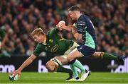 5 November 2022; Pieter-Steph du Toit of South Africa gets to the ball ahead of Jonathan Sexton of Ireland during the Bank of Ireland Nations Series match between Ireland and South Africa at the Aviva Stadium in Dublin. Photo by Brendan Moran/Sportsfile