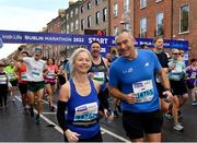 30 October 2022; Imelda Szumlicki and  Simon Szumlicki compete in the 2022 Irish Life Dublin Marathon. 25,000 runners took to the Fitzwilliam Square start line to participate in the 41st running of the Dublin Marathon after a two-year absence. Photo by Sam Barnes/Sportsfile