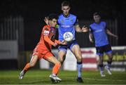 11 November 2022; Phoenix Patterson of Waterford in action against Jack Keaney of UCD during the SSE Airtricity League Promotion / Relegation Play-off match between UCD and Waterford at Richmond Park in Dublin. Photo by Tyler Miller/Sportsfile