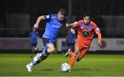 11 November 2022; Michael Gallagher of UCD in action against Phoenix Patterson of Waterford during the SSE Airtricity League Promotion / Relegation Play-off match between UCD and Waterford at Richmond Park in Dublin. Photo by Tyler Miller/Sportsfile