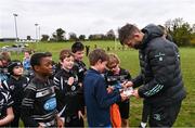 13 November 2022; Leinster Rugby player Ross Byrne signs autographs during a Dundalk RFC Minis training session at Dundalk RFC in Dundalk, Louth. Photo by Ramsey Cardy/Sportsfile