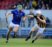 20 November 2022; Ben Cunningham of St Finbarr’s in action against Brandon O’Connell of Ballyea during the AIB Munster GAA Hurling Senior Club Championship Semi-Final match between Ballyea and St Finbarr's at Cusack Park in Ennis, Clare. Photo by Daire Brennan/Sportsfile