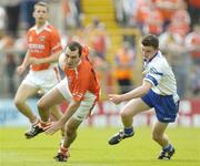 23 May 2004; Martin O'Rourke, Armagh, in action against Gary McQuaid, Monaghan. Bank of Ireland Ulster Senior Football Championship, Monaghan v Armagh, St. Tighernach's Park, Clones, Co. Monaghan. Picture credit; Damien Eagers / SPORTSFILE