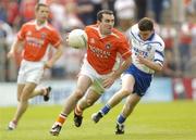 23 May 2004; Martin O'Rourke, Armagh, in action against Gary McQuaid, Monaghan. Bank of Ireland Ulster Senior Football Championship, Monaghan v Armagh, St. Tighernach's Park, Clones, Co. Monaghan. Picture credit; Damien Eagers / SPORTSFILE