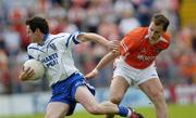 23 May 2004; Gary McQuaid, Monaghan, in action against Paddy McKeever, Armagh. Bank of Ireland Ulster Senior Football Championship, Monaghan v Armagh, St. Tighernach's Park, Clones, Co. Monaghan. Picture credit; Damien Eagers / SPORTSFILE