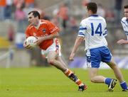 23 May 2004; Martin O'Rourke, Armagh, in action against Raymond Ronaghan,14, Monaghan. Bank of Ireland Ulster Senior Football Championship, Monaghan v Armagh, St. Tighernach's Park, Clones, Co. Monaghan. Picture credit; Damien Eagers / SPORTSFILE