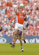 23 May 2004; Martin O'Rourke, Armagh, wins possession against Dick Clerkin, Monaghan. Bank of Ireland Ulster Senior Football Championship, Monaghan v Armagh, St. Tighernach's Park, Clones, Co. Monaghan. Picture credit; Pat Murphy / SPORTSFILE