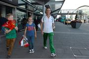 16 August 2013; Men's 50k walk gold medal winner Robert Heffernan with children Cathal, age 8, and Meghan, age 10, in Dublin airport on his return from the IAAF World Athletics Championships in Moscow. Dublin Airport, Dublin. Picture credit: Brian Lawless / SPORTSFILE