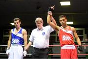 16 August 2013; Ronan Date, St Paul's Bpxing Club, right, is declared the winner over Sean Duffy, Holy Trinity Boxing Club, after their 64kg bout. IABA Elite Boxing Competition, National Stadium, Dublin. Photo by Sportsfile