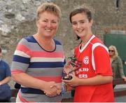 17 August 2013; Alex Kavanagh, Shelbourne, is presented with the player of the match award by Niamh O'Donoghue, Chairperson WFAI. FAI Umbro U14 Women's Cup Final, Peamount United v Shelbourne, Oscar Traynor Centre, Coolock, Dublin. Picture credit: Pat Murphy / SPORTSFILE