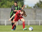 17 August 2013; Kate Mooney, Shelbourne,  in action against Lauryn O'Callaghan, Peamount United. FAI Umbro U14 Women's Cup Final, Peamount United v Shelbourne, Oscar Traynor Centre, Coolock, Dublin. Picture credit: Pat Murphy / SPORTSFILE