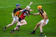 3 December 2022; Mikey Mahony of Ballygunner is tackled by Stan Lineen and Gary Brennan of Ballyea during the AIB Munster GAA Hurling Senior Club Championship Final match between Ballygunner of Waterford and Ballyea of Clare at FBD Semple Stadium in Thurles, Tipperary. Photo by Ray McManus/Sportsfile