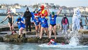 10 December 2022; People get freezin’ for a reason to support Special Olympics Ireland as the organisation raises funds to send over 70 athletes to the World Games in Berlin 2023. Swimmers during the Special Olympics Ireland Polar Plunge at Sandycove Beach in Dublin. Photo by Eóin Noonan/Sportsfile