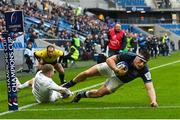 10 December 2022; Dan Sheehan of Leinster evades the tackle of Finn Russell of Racing 92 on his way to scoring his side's second try during the Heineken Champions Cup Pool A Round 1 match between Racing 92 and Leinster at Stade Océane in Le Havre, France. Photo by Harry Murphy/Sportsfile