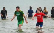 10 December 2022; People get freezin’ for a reason to support Special Olympics Ireland as the organisation raises funds to send over 70 athletes to the World Games in Berlin 2023. Volunteers during the Special Olympics Ireland Polar Plunge at Clogherhead Beach in Louth. Photo by Ramsey Cardy/Sportsfile