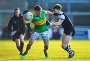 11 December 2022; Eunan Mulholland of Glen in action against Miceal Rooney of Kilcoo during the AIB Ulster GAA Football Senior Club Championship Final match between Glen Watty Graham's of Derry and Kilcoo of Down at the Athletics Grounds in Armagh. Photo by Ben McShane/Sportsfile