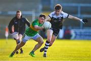 11 December 2022; Eunan Mulholland of Glen in action against Miceal Rooney of Kilcoo during the AIB Ulster GAA Football Senior Club Championship Final match between Glen Watty Graham's of Derry and Kilcoo of Down at the Athletics Grounds in Armagh. Photo by Ben McShane/Sportsfile