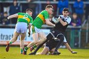 11 December 2022; Eugene Branagan of Kilcoo in action against Conor Convery of Glen during the AIB Ulster GAA Football Senior Club Championship Final match between Glen Watty Graham's of Derry and Kilcoo of Down at the Athletics Grounds in Armagh. Photo by Ben McShane/Sportsfile