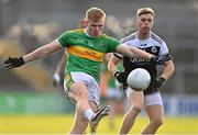 11 December 2022; Alex Doherty of Glen and Jerome Johnston of Kilcoo during the AIB Ulster GAA Football Senior Club Championship Final match between Glen Watty Graham's of Derry and Kilcoo of Down at the Athletics Grounds in Armagh. Photo by Ben McShane/Sportsfile