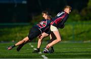 15 December 2022; Fionn Cuddy of Mountrath is tackled by Quin Monson of St Colmcilles during the Bank of Ireland Leinster Rugby Division 3A JCT Development Shield match between Mountrath School and St. Colmcilles Community School at Energia Park in Dublin. Photo by Ben McShane/Sportsfile