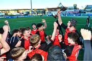 15 December 2022; St Mary's captain Cian Butler lifts the Pat Rossiter cup after the Bank of Ireland Leinster Rugby Pat Rossiter Cup (JCT) match between St. Mary's CBS, Portlaoise and Ardgillan Community College at Energia Park in Dublin. Photo by Ben McShane/Sportsfile