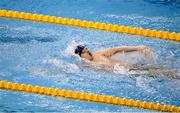 16 December 2022; Eoghan Rynn of Trident SC competes in the heats of the Men's 100m backstroke during day two of the Irish National Winter Swimming Championships 2022 at the National Aquatic Centre, on the Sport Ireland Campus, in Dublin. Photo by David Fitzgerald/Sportsfile