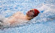 16 December 2022; Liam Og Mathers of Newry SC competes in the heats of the Men's 100m backstroke during day two of the Irish National Winter Swimming Championships 2022 at the National Aquatic Centre, on the Sport Ireland Campus, in Dublin. Photo by David Fitzgerald/Sportsfile