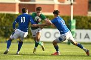 17 December 2022; Sam Berman of Ireland is tackled by Giovanni Sante, left, and Lorenzo Elettri of Italy during the U20 Rugby International Friendly match between Ireland and Italy at Clontarf RFC in Dublin. Photo by Sam Barnes/Sportsfile