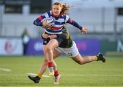 17 December 2022; Méabh Deely of Blackrock College is tackled by Aimee Clarke of Railway Union during the Energia AIL Women's Division Final match between Blackrock College and Railway Union at Energia Park in Dublin. Photo by Seb Daly/Sportsfile