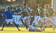 17 December 2022; Danny Sheahan of Ireland is tackled by Lorenzo Elettri of Italy, with the support of team-mate Matthias Douglas, left, during the U20 Rugby International Friendly match between Ireland and Italy at Clontarf RFC in Dublin. Photo by Sam Barnes/Sportsfile