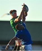 17 December 2022; Joe Hopes of Ireland and David Odiase of Italy contest a high ball during the U20 Rugby International Friendly match between Ireland and Italy at Clontarf RFC in Dublin. Photo by Sam Barnes/Sportsfile
