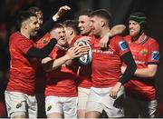 6 January 2023; Liam Coombes of Munster, centre, celebrates after scoring his side's try during the United Rugby Championship between Munster and Emirates Lions at Musgrave Park in Cork. Photo by Eóin Noonan/Sportsfile