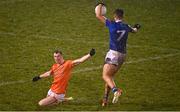 11 January 2023; Tiarnan Madden of Cavan goes past the tackle of Justin Kieran of Armagh during the Bank of Ireland Dr McKenna Cup Round 3 match between Cavan and Armagh at Kingspan Breffni in Cavan. Photo by Eóin Noonan/Sportsfile