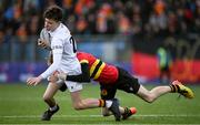 12 January 2023; Phelim Doyle of Presentation College Bray is tackled by Tom Gleeson of CBC Monkstown during the Bank of Ireland Fr Godfrey Cup First Round match between CBC Monkstown and Presentation College Bray at Energia Park in Dublin. Photo by Harry Murphy/Sportsfile