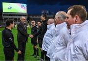 14 January 2023; Uachtarán Chumann Lúthchleas Gael Larry McCarthy shakes hands with sideline official Cathal Daly as he greets match officials before the AIB GAA Hurling All-Ireland Junior Championship Final match between Ballygiblin of Cork and Easkey of Sligo at Croke Park in Dublin. Photo by Piaras Ó Mídheach/Sportsfile