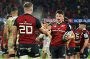 14 January 2023; Calvin Nash, right, and Alex Kendellen of Munster celebrate victory after the Heineken Champions Cup Pool B Round 3 match between Munster and Northampton Saints at Thomond Park in Limerick. Photo by Brendan Moran/Sportsfile