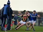 15 January 2023; Alan Murphy of Kilkenny in action against PJ Scully, second from right, and Aaron Dunphy of Laois during the Walsh Cup Group 2 Round 2 match between Laois and Kilkenny at Kelly Daly Park in Rathdowney, Laois. Photo by Sam Barnes/Sportsfile