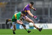 22 January 2023; Tiarnán Flannagan of Watty Graham's Glen is tackled by Shane Walsh of Kilmacud Crokes during the AIB GAA Football All-Ireland Senior Club Championship Final match between Watty Graham's Glen of Derry and Kilmacud Crokes of Dublin at Croke Park in Dublin. Photo by Ramsey Cardy/Sportsfile