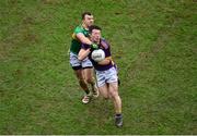 22 January 2023; Hugh Kenny of Kilmacud Crokes in action against Michael Warnock of Watty Graham's Glen during the AIB GAA Football All-Ireland Senior Club Championship Final match between Glen of Derry and Kilmacud Crokes of Dublin at Croke Park in Dublin. Photo by Daire Brennan/Sportsfile