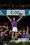 22 January 2023; Rory O'Carroll of Kilmacud Crokes lifts the Andy Merrigan Cup after the AIB GAA Football All-Ireland Senior Club Championship Final match between Watty Graham's Glen of Derry and Kilmacud Crokes of Dublin at Croke Park in Dublin. Photo by Piaras Ó Mídheach/Sportsfile