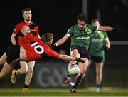 25 January 2023; Patrick Finnegan of Queen's University Belfast is tackled by Jack Murphy of UCC during the HE GAA Sigerson Cup Round 3 match between University College Cork and Queen's University Belfast at the GAA National Games Development Centre in Abbotstown, Dublin. Photo by Piaras Ó Mídheach/Sportsfile