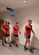 25 January 2023; UCC players, from right, Maurice Shanley, Killian Flavey, Mark Cronin and Ruairí Murphy make their way to the pitch for the second half of the HE GAA Sigerson Cup Round 3 match between University College Cork and Queen's University Belfast at the GAA National Games Development Centre in Abbotstown, Dublin. Photo by Piaras Ó Mídheach/Sportsfile