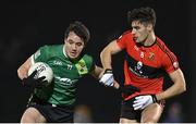 25 January 2023; Patrick Finnegan of Queen's University Belfast in action against Shane Merritt of UCC during the HE GAA Sigerson Cup Round 3 match between University College Cork and Queen's University Belfast at the GAA National Games Development Centre in Abbotstown, Dublin. Photo by Piaras Ó Mídheach/Sportsfile