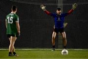 25 January 2023; UCC goalkeeper Dylan Foley prepares to face a penalty from Luke Donnelly of Queen's University Belfast in the penalty shoot-out of the HE GAA Sigerson Cup Round 3 match between University College Cork and Queen's University Belfast at the GAA National Games Development Centre in Abbotstown, Dublin. Photo by Piaras Ó Mídheach/Sportsfile