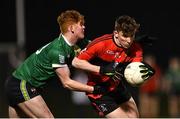 25 January 2023; Ruairí Murphy of UCC in action against Padraig Clancy of Queen's University Belfast during the HE GAA Sigerson Cup Round 3 match between University College Cork and Queen's University Belfast at the GAA National Games Development Centre in Abbotstown, Dublin. Photo by Piaras Ó Mídheach/Sportsfile