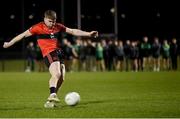 25 January 2023; Cathail O'Mahony of UCC shoots to score a penalty in the penalty shoot-out of the HE GAA Sigerson Cup Round 3 match between University College Cork and Queen's University Belfast at the GAA National Games Development Centre in Abbotstown, Dublin. Photo by Piaras Ó Mídheach/Sportsfile